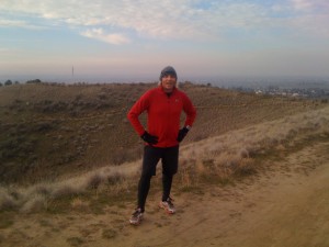 Thanksgiving 10K run - Taking a break on the trail.  The Idaho State Veterans' Cemetery flag is in the background.