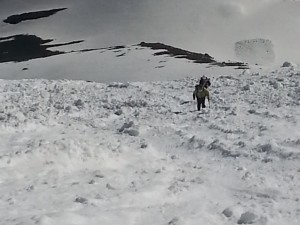 Jim and Tom heading up through some old avalanche debris.